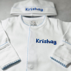 White with Baby Blue Footie and Hat